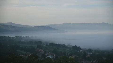 Timelapse of fog and mist in valley Stock Footage