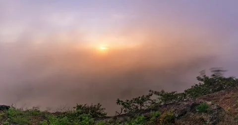 Timelapse The fog is diffused, obscuring the first light from the sun at Mo.. Stock Footage 252202163