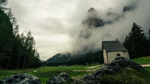 Timelapse of fog passing massive mountains Stock Footage 126601112