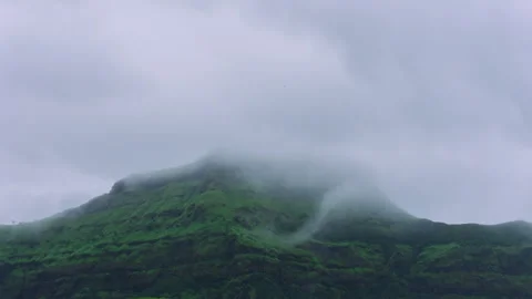 Timelapse - Fog rolling over a mountain 4K30 Stock Footage 270894554