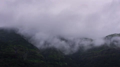 Timelapse - Fog rolling through a mountain 4K30 Stock Footage 270893760