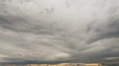 Timelapse footage captures dense storm clouds moving Stock Footage 338041896