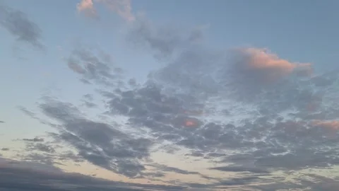 A timelapse footage of clouds around dusk 動画素材 259612536