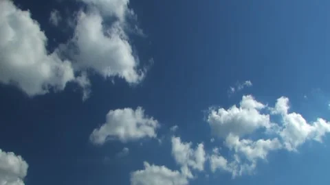 Timelapse footage of clouds forming in the deep blue sky. Stock Footage 285932201