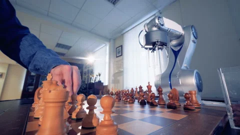 Timelapse footage of human and robot playing chess with each other Stock Footage 86610669