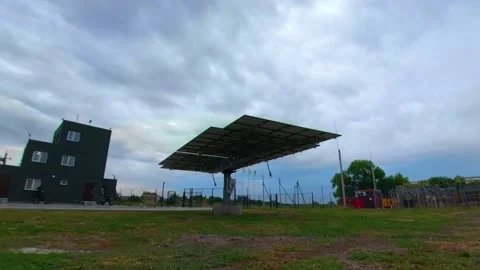 Timelapse footage of a special machine that turns the solar panels towards sun Stock Footage 160113862