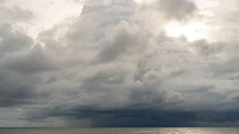 Timelapse footage of Storm clouds and rain over sea Stock Footage 134985264