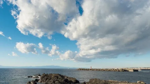 Timelapse footage of white clouds in the blue sky, Jogashima island, Kanagawa Stock Footage 151433255