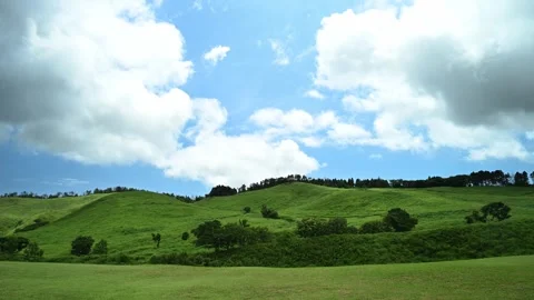 Timelapse footage of white clouds over green mountain plateau, Izu Peninsula Stock Footage 340241803