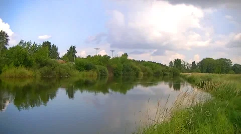 Timelapse - forest - river - clouds - two antennas for the navigation Stock Footage 65444527
