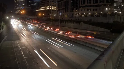 Timelapse of Freeway near Downtown Los Angeles at Night Stock Footage 128725317