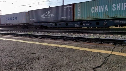 Timelapse freight trains moving in different directions at railway station. Stock Footage 302547397