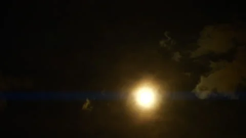 Timelapse of full moon, dark dramatic clouds in night sky, anamorphic time lapse Stock-Footage 234683349