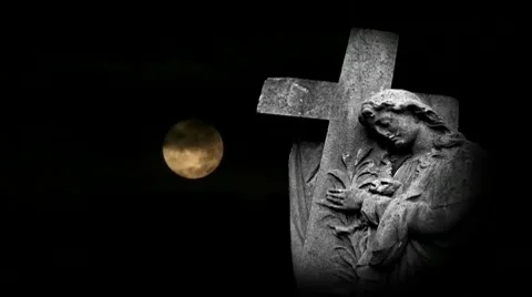 Timelapse full moon flowing past graveyard statue Stock Footage 10709531