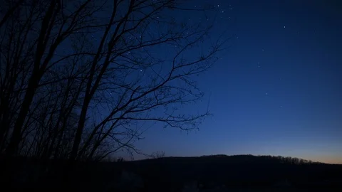 Timelapse of full moon rising over forest Stock Footage 105575411