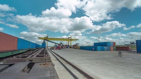 Timelapse Gantry Crane Unloads Containers from Train Stock Footage 78744019