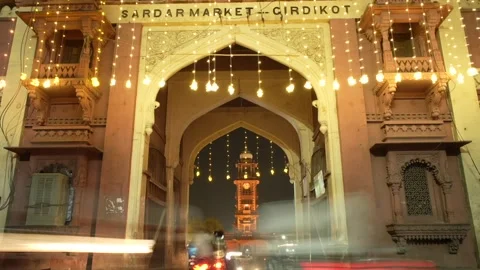Timelapse of Ghanta Ghar capturing vibrant night traffic in Jodhpur, India Stock Footage 327906288