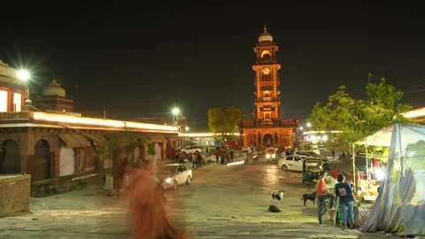 Timelapse of Ghanta Ghar capturing vibrant night traffic in Jodhpur, India Видео 327906292