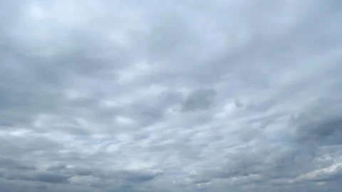 A timelapse of gloomy cloudy sky covered with clouds. Fast-moving clouds. Stock Footage 217370983