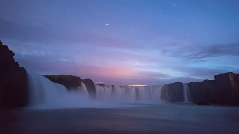 Timelapse of Gódafoss waterfall at sunset Stock Footage 83698255