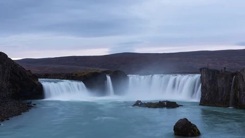 Timelapse of Gódafoss waterfall at sunset Stock Footage 83698381