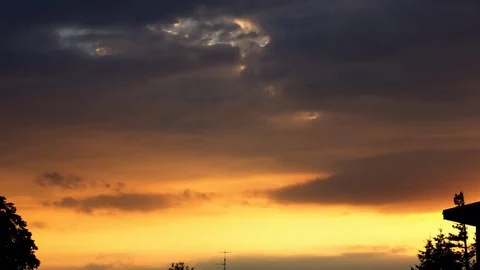 Timelapse  golden clouds at sunset Stock Footage 84443372