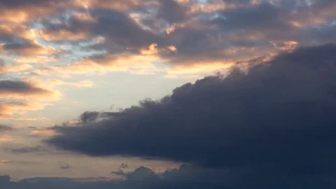 Timelapse  golden clouds at sunset Stock Footage 84446159