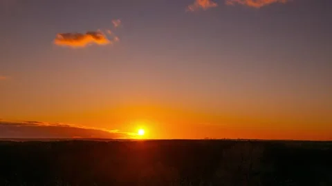 Timelapse Of Golden Sunset Sinking Below Forest Horizon Stock Footage 325718715