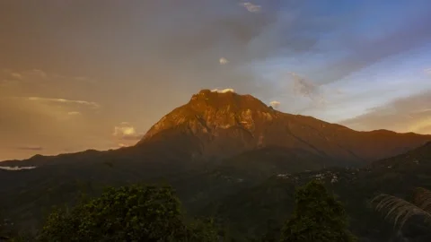 Timelapse of golden sunset view Mount Kinabalu, Sabah, Malaysia. Stock Footage 195004024
