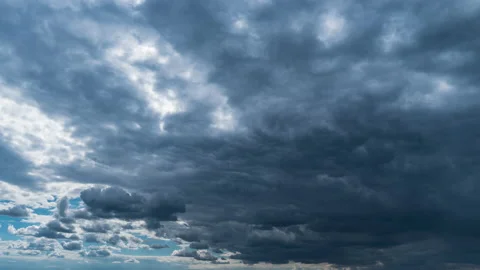 Timelapse Gray Rainy Clouds Float Across the Dark Sky on a Cloudy Day Stock Footage 209147176