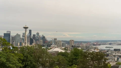 Timelapse of gray sky over Seattle WA cityscape and Mt Rainier and seaport 4k Stock Footage 91799116
