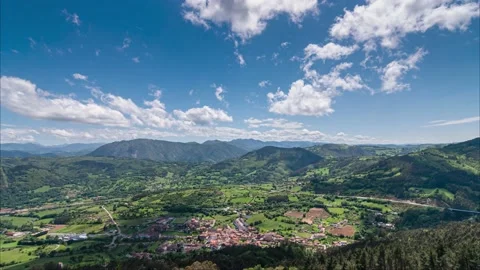 Timelapse of a green valley as the clouds pass by in Asturias Stock Footage 154604172