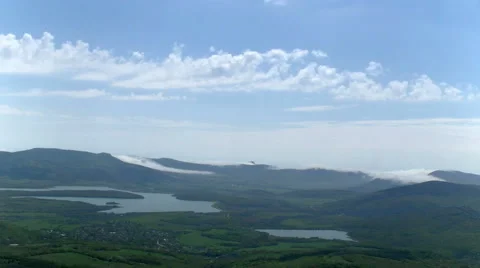 Timelapse in a green valley with lakes Stock Footage 51019290