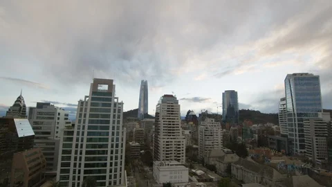 Timelapse of grey cloud travelling across sky above modern city with skyscrapers Stock Footage 124239151