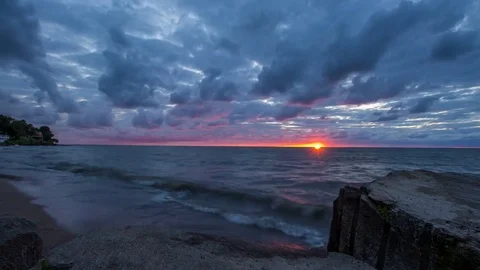Timelapse of Grey Clouds Moving in at Sunset Stock Footage 81449092