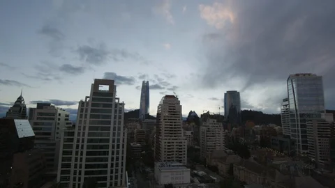 Timelapse of grey clouds passing on sky above skyscrapers in modern city Stock Footage 124239106