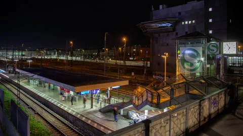 Timelapse of Hackerbrucke Bridge and Metro Station at Night in Munich, Germany Stock Footage 240349255