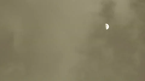 Timelapse of halfmoon and clouds Stock Footage 9453915