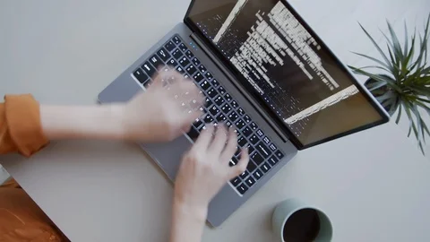 Timelapse of Hands of Female Programmer Writing Computer Code on Laptop Stock-Footage 123276236