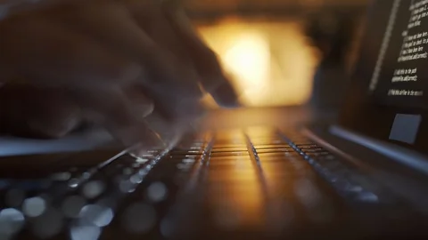 Timelapse of Hands of Woman Writing Code on Laptop Illuminated by Lamp Stock Footage 123275422