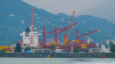 Timelapse: harbor cranes during unloading of a cargo ship in the Batumi seaport 스톡 동영상 339686717