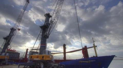 Timelapse in harbor with massive clouds Видео 58470765