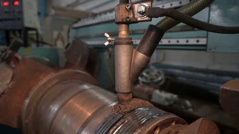Timelapse. Hard surfacing by submerge arc welding process. Cnc machine builds up Stock Footage 75249057