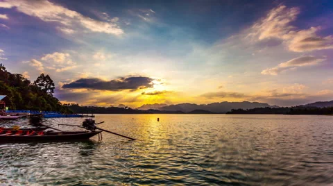 Timelapse Heavenly Sunset. Cheow Lan Lake or Rajjaprabha Dam Reservoir, Thailand Video stock 56237611