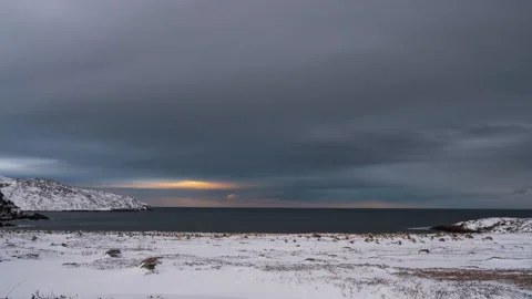 Timelapse of heavy gray clouds in sunset sky over the ocean. Evening sky. Stock Footage 166720371