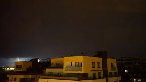 Timelapse of heavy lightning storm rolling over apartment buildings in Prague Video stock 91536581