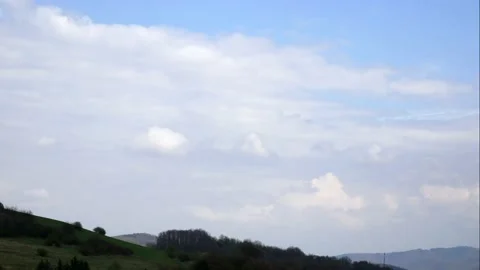 Timelapse - Heavy rain clouds over the mountainous landscape Stock Footage 134166012