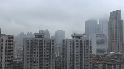 Timelapse heavy rain storm monsoon Guangzhou downtown tall skyscraper day modern Stock Footage 55017202