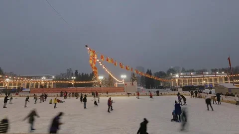 Timelapse, in heavy snow, people ride a skating rink. January 13 Kiev Ukraine Video stock 148116953