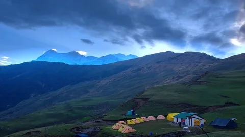 Timelapse of high altitude meadows with clouds in the background Stock Footage